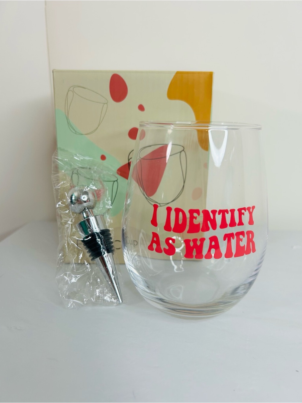 Stemless Wine Glass - pink 'I Identify As Water' Print with wine stopper